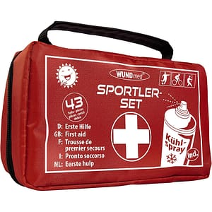 secours Kit de premiers secours complet dans une sacoche rouge robuste pour le sport.